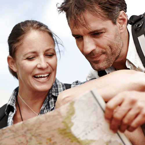 Web design thumbnail depicting a man and woman looking at a map