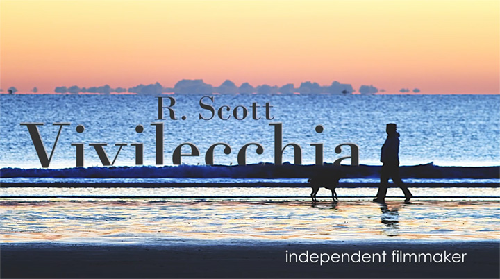 Demo reel thumbnail depicting a woman and dog at the shoreline with the words R. Scott Vivilecchia sitting in the waves
